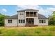 Two-story home featuring a screened-in porch, deck, and a spacious backyard at 4225 Burlington Mills Rd, Wake Forest, NC 27587