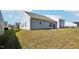 A suburban backyard with a small patio, perfect for outdoor enjoyment at 425 Legacy Dr, Youngsville, NC 27596