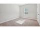 Bedroom featuring neutral carpet and a window at 425 Legacy Dr, Youngsville, NC 27596