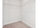Empty walk-in closet with carpeted floors and wire shelving at 425 Legacy Dr, Youngsville, NC 27596