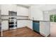 Open kitchen with stainless steel appliances and an eat-in bar at 425 Legacy Dr, Youngsville, NC 27596
