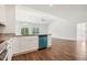 Living room featuring wood flooring, granite counters, and modern fixtures at 425 Legacy Dr, Youngsville, NC 27596