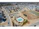 Aerial view of a residential community featuring a swimming pool and a pond at 4508 Brintons Cottage St, Raleigh, NC 27616