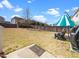 A backyard area shows grass, fence, patio, seating area, and trees at 4508 Brintons Cottage St, Raleigh, NC 27616