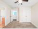 Bright bedroom with neutral walls, closet, and view of an adjacent room at 4508 Brintons Cottage St, Raleigh, NC 27616