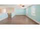 Spacious bonus room with wood-look floors, ceiling fan, and plenty of natural light at 4508 Brintons Cottage St, Raleigh, NC 27616