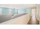 Open bonus room with wood flooring, neutral walls, and natural light from multiple windows at 4508 Brintons Cottage St, Raleigh, NC 27616