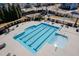 Aerial view of the community pool with lane dividers and lounge chairs at 4508 Brintons Cottage St, Raleigh, NC 27616