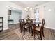 Formal dining room with natural light, curtains, and traditional-style furnishings at 4508 Brintons Cottage St, Raleigh, NC 27616