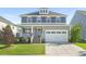 Charming two-story home featuring a covered porch, two car garage, and well-maintained lawn at 4508 Brintons Cottage St, Raleigh, NC 27616