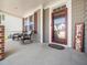Inviting front porch with rocking chairs and a decorative welcome sign at 4508 Brintons Cottage St, Raleigh, NC 27616