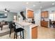 Kitchen with granite countertops and bar seating with access to the Living Room at 4508 Brintons Cottage St, Raleigh, NC 27616