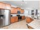 Bright kitchen featuring stainless steel appliances and granite countertops at 4508 Brintons Cottage St, Raleigh, NC 27616