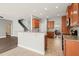 Open kitchen with granite countertops, stainless steel appliances, and seamless flow to living areas at 4508 Brintons Cottage St, Raleigh, NC 27616