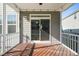 View of screened in porch with wood deck looking at the back of the home at 4508 Brintons Cottage St, Raleigh, NC 27616