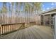 Wooden deck overlooking a tranquil wooded area, ideal for outdoor entertaining at 47 Dover Grant Ct, Chapel Hill, NC 27517