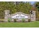 Aster Ridge community sign with stone pillars and well-maintained landscaping at 521 Eastwood St, Durham, NC 27703