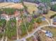 Aerial view of neighborhood with mature trees and large lots at 5661 Quail Covey Ln, Wendell, NC 27591