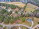 Aerial view of neighborhood featuring mature trees and large lots at 5661 Quail Covey Ln, Wendell, NC 27591