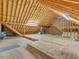 Large attic space with exposed beams and subflooring, ready for buildout and storage at 5661 Quail Covey Ln, Wendell, NC 27591