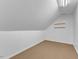 Attic space with neutral walls and carpet, ready for customization at 5661 Quail Covey Ln, Wendell, NC 27591