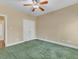 Spacious bedroom features a ceiling fan and neutral wall color, ready for personalization at 5661 Quail Covey Ln, Wendell, NC 27591