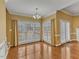 Dining room with hardwood floors, large windows and lots of natural light at 5661 Quail Covey Ln, Wendell, NC 27591