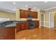 Kitchen featuring modern stainless-steel appliances and granite counters at 5661 Quail Covey Ln, Wendell, NC 27591
