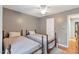 Comfortable bedroom with two beds, soft lighting, and a serene atmosphere for restful sleep at 573 Broadmoor Ct, Sanford, NC 27332