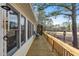 Expansive deck running along the back of the house, offering scenic views and outdoor relaxation at 573 Broadmoor Ct, Sanford, NC 27332