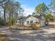 Well-kept ranch home with a two-car garage, nestled among mature trees in a peaceful neighborhood at 573 Broadmoor Ct, Sanford, NC 27332