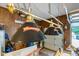Garage with lighting fixtures over workbench, and storage area for tools and equipment at 573 Broadmoor Ct, Sanford, NC 27332