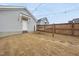 Cozy backyard with a hammock and string lights, ideal for relaxing or reading a book outdoors at 656 Groveview Wynd, Wendell, NC 27591