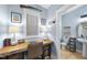 Charming office with a unique desk and an ensuite half bathroom at 656 Groveview Wynd, Wendell, NC 27591