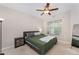 Bedroom featuring a bed, a ceiling fan, and natural light at 702 Great Eno Path, Hillsborough, NC 27278