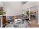 Spacious living room with soaring ceiling that flows into dining and kitchen at 702 Great Eno Path, Hillsborough, NC 27278