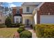 Inviting home exterior with neat landscaping and walkway leading to a welcoming front entrance at 715 Southshore Pkwy, Durham, NC 27703