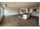 Spacious open-concept living area with a central island and ample counter space for modern living at 720 Hipwood Dr, Zebulon, NC 27597