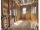 Bedroom framed in wood with natural light at 7429 Wexford Woods Ln, Wake Forest, NC 27587
