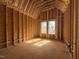 Bedroom framed with wood and abundant natural light at 7429 Wexford Woods Ln, Wake Forest, NC 27587
