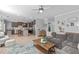 Open-concept living room flows into the kitchen, perfect for entertaining guests at 749 Lake Artesia Ln, Fuquay Varina, NC 27526