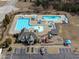 Aerial view of community pool and playground with ample parking at 749 Lake Artesia Ln, Fuquay Varina, NC 27526