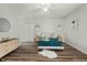 Serene bedroom with neutral tones, laminate flooring, and a decorative rug at 847 Estes St, Durham, NC 27701