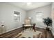 Bright office features modern decor, a glass desk, and natural light at 847 Estes St, Durham, NC 27701