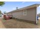 Exterior of home with a wooden deck overlooking a spacious backyard, ideal for outdoor relaxation and entertainment at 913 S Willhaven Dr, Fuquay Varina, NC 27526