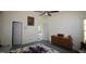 Comfortable bedroom features a ceiling fan, two closets and neutral colored walls at 100 Sandy Hook Way, Cary, NC 27513