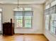 Bright dining area featuring beautiful hardwood floors, natural light and views of the outdoors at 100 Sandy Hook Way, Cary, NC 27513