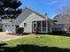 Charming home featuring a screened in porch, deck and a two car garage at 100 Sandy Hook Way, Cary, NC 27513
