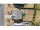 Aerial view of the home's roof, fenced backyard, and surrounding neighborhood at 1008 Scotch Pine Way, Mebane, NC 27302