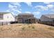 Aerial view of home's backyard, featuring a large yard and screened-in porch at 1008 Scotch Pine Way, Mebane, NC 27302